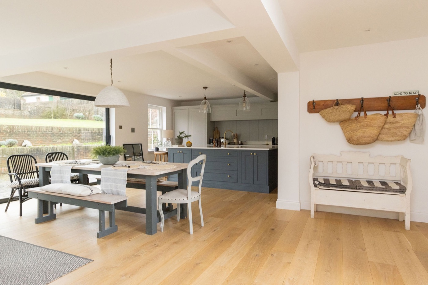 Open-plan kitchen and dining room opening onto the garden at The Lookout Brighton